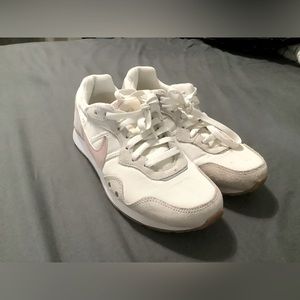 Nike pink and white shoes